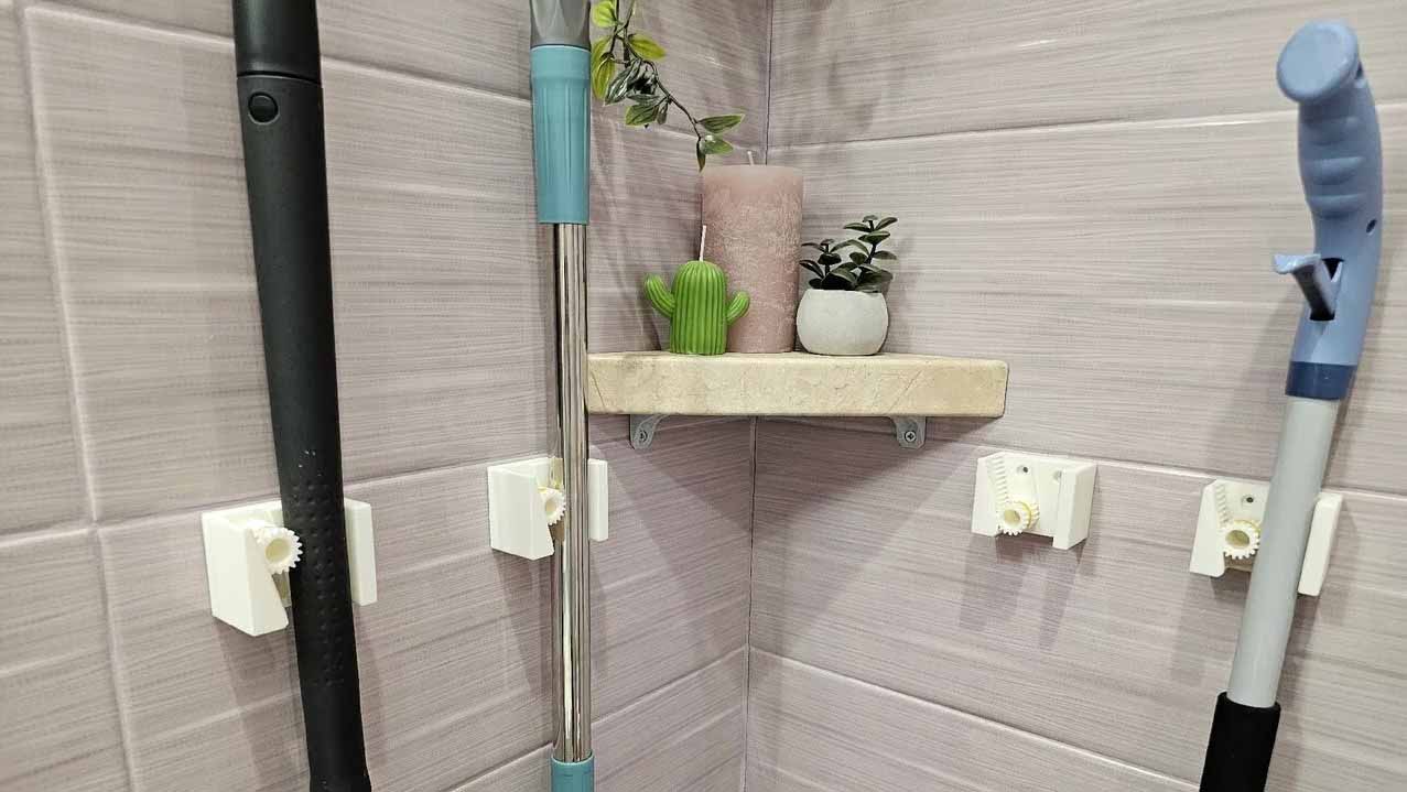 نگهدارنده جارو با نیروی جاذبه